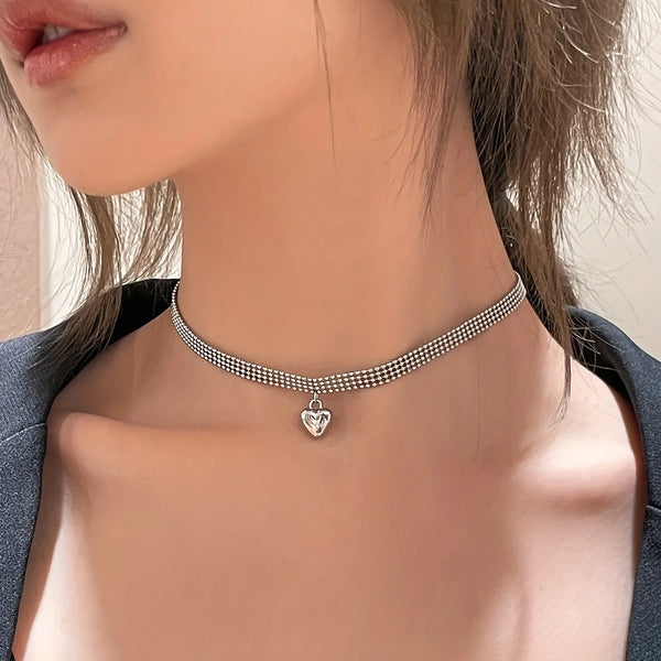"Enhance Your Style: Metallic Round Bead Heart-shaped Pendant Choker Necklace"